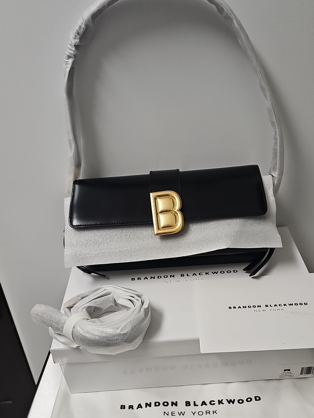Brandon Blackwood Black Leather Shoulder Bag with Gold 'B' Accent